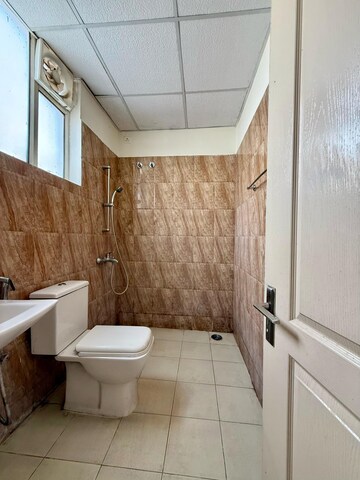 Attached Bathroom in 3 BHK Apartment at Sushma Elite Cross, Dhakoli Village – for Sale