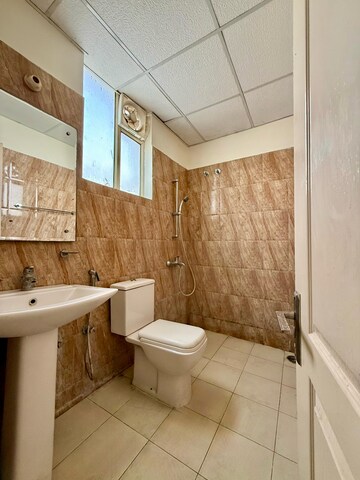 Attached Bathroom in 3 BHK Apartment at Sushma Elite Cross, Dhakoli Village – for Sale