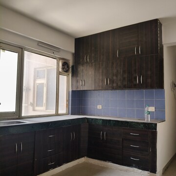 Kitchen in 2 BHK Apartment at ROF Aalayas, Sector 102 – for Rent