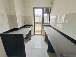 Kitchen in 1.5 BHK Apartment at Runwal Gardens, Dombivli East – for Sale