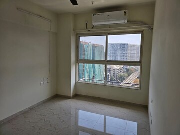 Bedroom in 2 BHK Apartment at JP Eminence, Andheri West – for Rent