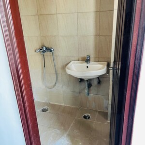 Bathroom in 2 BHK Apartment at Ajnara Integrity, Sehani Khurd – for Sale