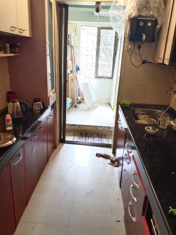 Kitchen in 3 BHK Apartment at Shiv Shrishti CHS, Powai – for Rent