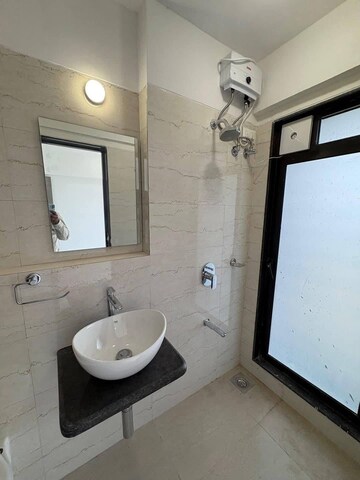 Bathroom in 1 BHK Apartment at Platinum Casa Millennia, Andheri West – for Rent