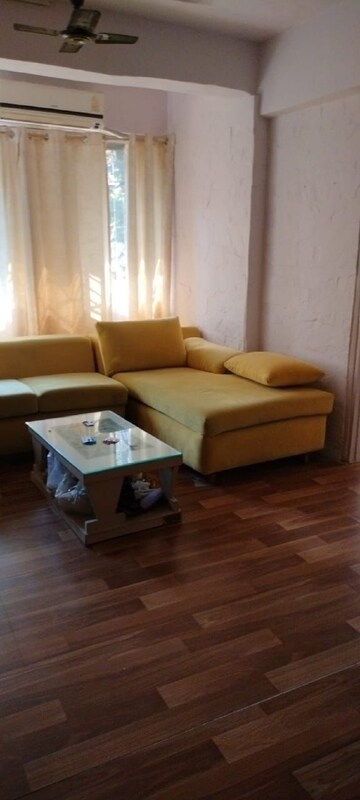 Living Room in 1 BHK Apartment at Juhu – for Rent