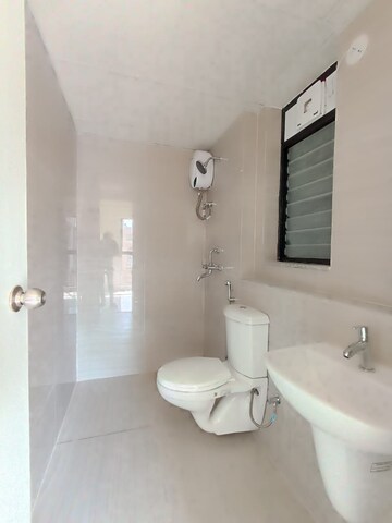 Bathroom in 2 BHK Apartment at Runwal Gardens, Dombivli East – for Rent
