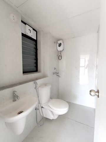 Bathroom in 2 BHK Apartment at Runwal Gardens, Dombivli East – for Sale