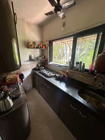 Kitchen in 3 BHK Apartment at Orchid Enclave CHS, Andheri East – for Sale