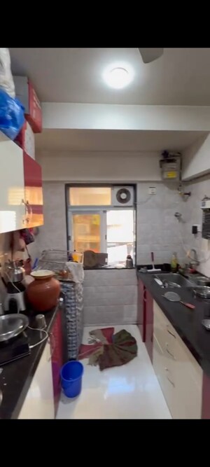 Kitchen in 2 BHK Apartment at N Woods Trishna View, Andheri East – for Sale