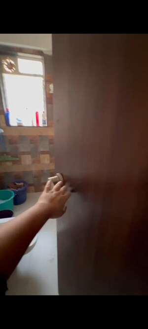 Bathroom in 2 BHK Apartment at N Woods Trishna View, Andheri East – for Sale