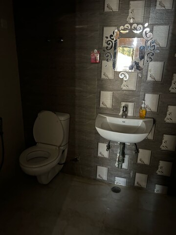 Bathroom in 3 BHK Apartment at Aims Golf City, Sector 75 – for Rent