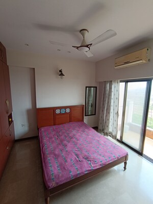 Bedroom in 3 BHK Apartment at NRI Complex Phase 2, Seawoods – for Rent