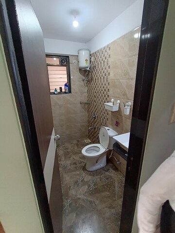 Bathroom in 3 BHK Apartment at NRI Complex Phase 2, Seawoods – for Rent
