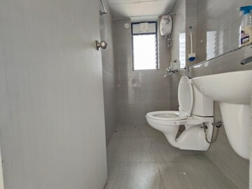 Bathroom in 3 BHK Apartment at Runwal Gardens, Dombivli East – for Rent