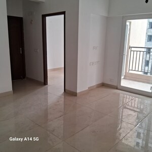 Living Room in 2 BHK Apartment at Amrapali Golf Homes, Sector 4 Greater Noida – for Sale