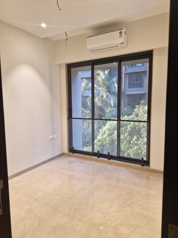 Bedroom in 2 BHK Apartment at Rishabraj Blue Lotus, Khar West – for Rent