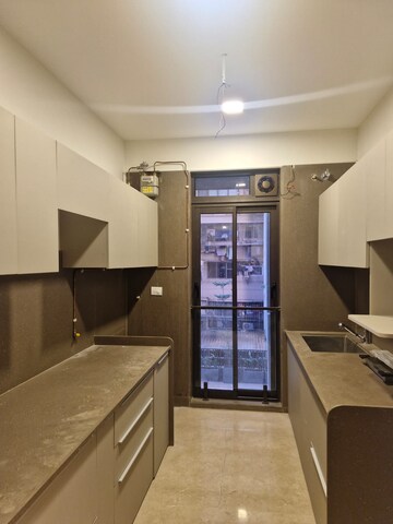 Kitchen in 2 BHK Apartment at Rishabraj Blue Lotus, Khar West – for Rent