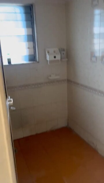 Bathroom in 1 BHK Apartment at Agarwal Green Village, Mira Road – for Rent