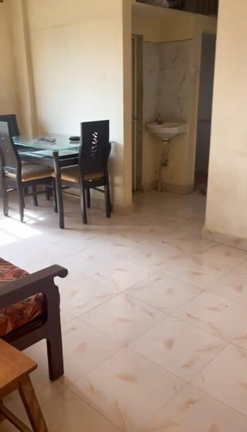 Living Room in 1 BHK Apartment at Agarwal Green Village, Mira Road – for Rent