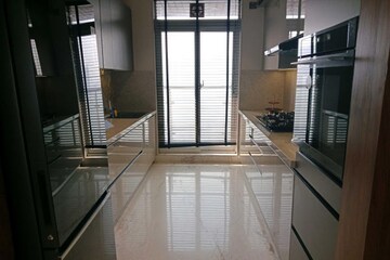 Kitchen in 3 BHK Apartment at Ruparel Jewel, Parel – for Sale