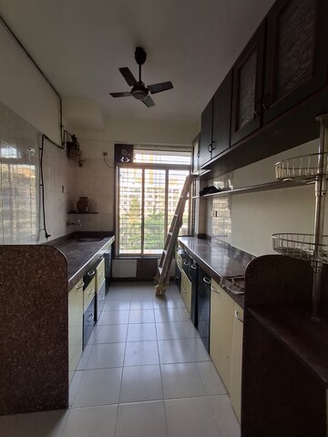 Kitchen in 2 BHK Apartment at Vasant Sagar, Kandivali East – for Rent