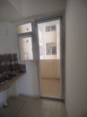 Kitchen in 2 BHK Apartment at Signature Orchard Avenue 2, Sector 93 – for Rent