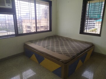 Bedroom in 2 BHK Apartment at Samarth Ashish CHS, Andheri West – for Rent