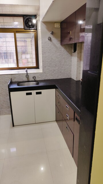 Kitchen in 1 BHK Apartment at Lodha Paradise, Majiwada – for Rent