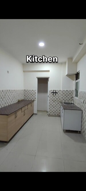 Kitchen in 4 BHK Apartment at Gaur City 2 - 16th Avenue, Sector 16c Greater Noida – for Sale