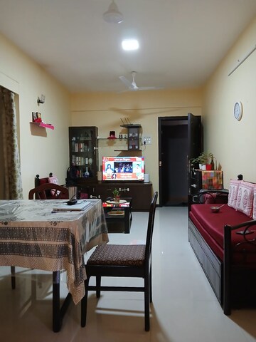 Living Room in 1 BHK Apartment at Manali Building, Malad West – for Rent