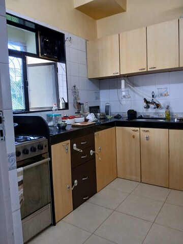 Kitchen in 1 BHK Apartment at Manali Building, Malad West – for Rent