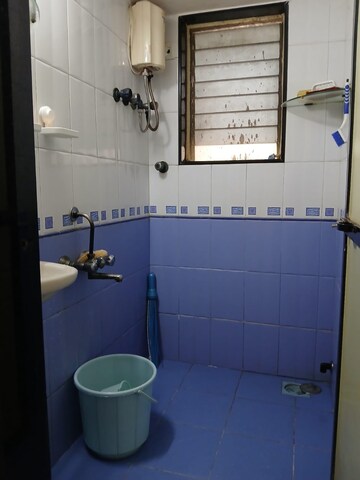 Bathroom in 1 BHK Apartment at Manali Building, Malad West – for Rent
