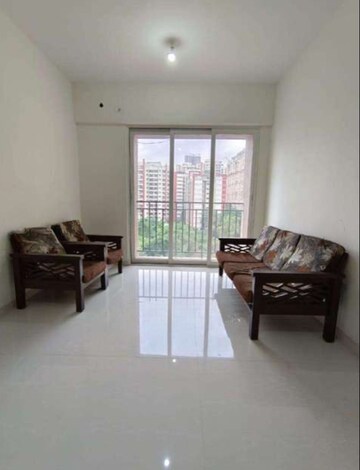 Living Room in 1 BHK Apartment at Vijay Orovia, Ghodbunder Road – for Rent