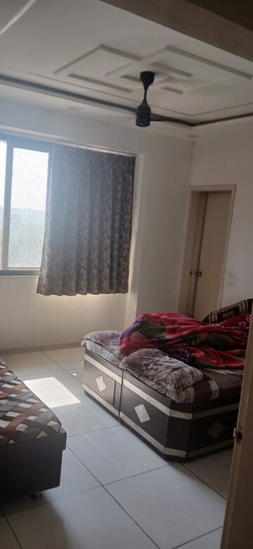 Bedroom in 2 BHK Apartment at Rajvi Aashirvad Heights, Vasna – for Rent