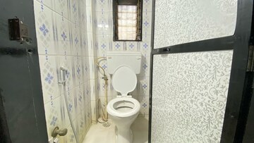 Bathroom in 1 BHK Apartment at Millenium Arcade CHS, Dombivli West – for Rent