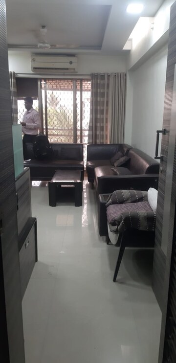 Living Room in 2 BHK Apartment at Ganesh Krupa CHS Santacruz, Santacruz West – for Rent