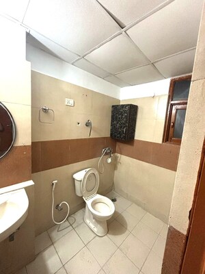 Bathroom in 3 BHK Apartment at Raj Nagar Extension – for Sale