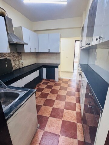 Kitchen in 4 BHK Apartment at Quantum Colonisers Quantum Residency, Raj Nagar Extension – for Sale