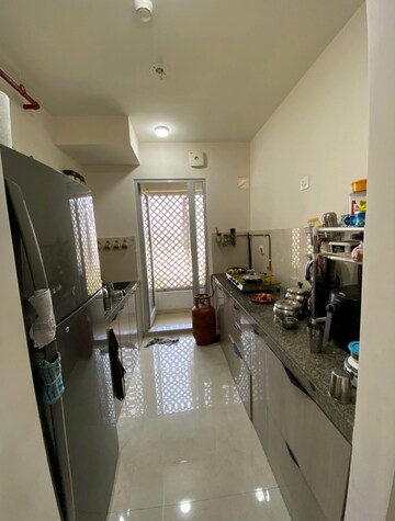 Kitchen in 2 BHK Apartment at Piramal Vaikunth, Balkum Pada – for Rent