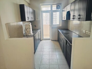 Kitchen in 3 BHK Apartment at Amrapali Silicon City, Sector 76 – for Rent