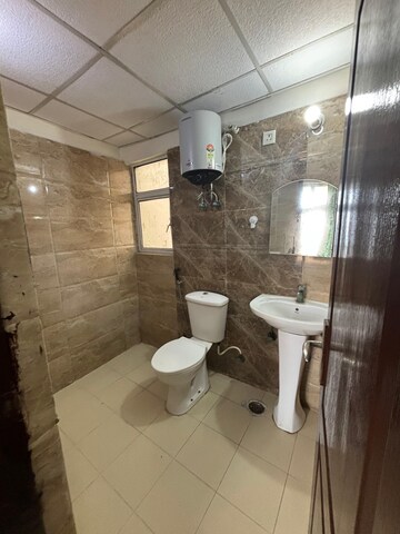 Bathroom in 3 BHK Apartment at Amrapali Silicon City, Sector 76 – for Rent