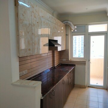 Kitchen in 3 BHK Apartment at Amrapali Silicon City, Sector 76 – for Rent