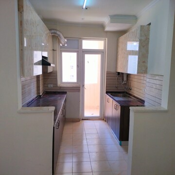Kitchen in 3 BHK Apartment at Amrapali Silicon City, Sector 76 – for Rent