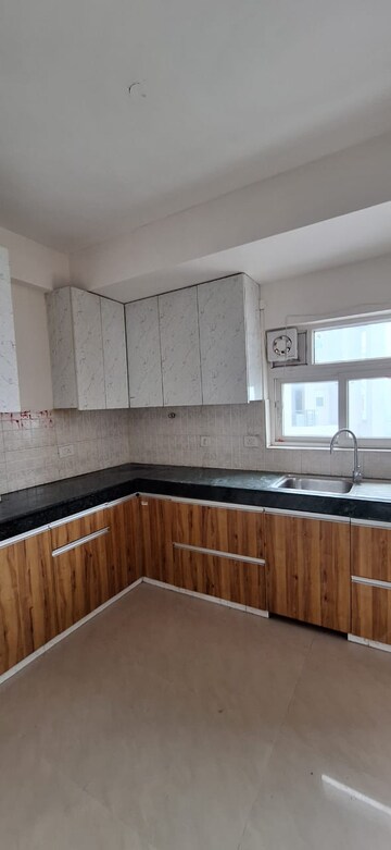 Kitchen in 3 BHK Apartment at SS The Coralwood, Sector 84 – for Rent