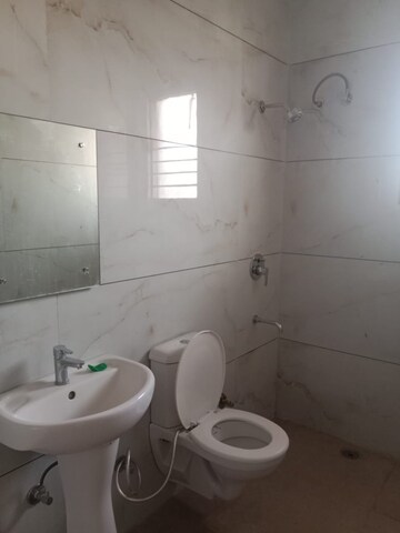 Bathroom in 3 BHK Builder Floor at Guru Nanak Enclave, Dhakoli Village – for Rent