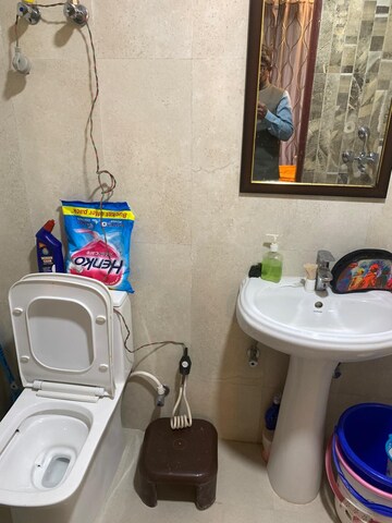 Bathroom in 2 BHK Apartment at Urban Axis Urban Woods, Sushant Golf City – for Rent