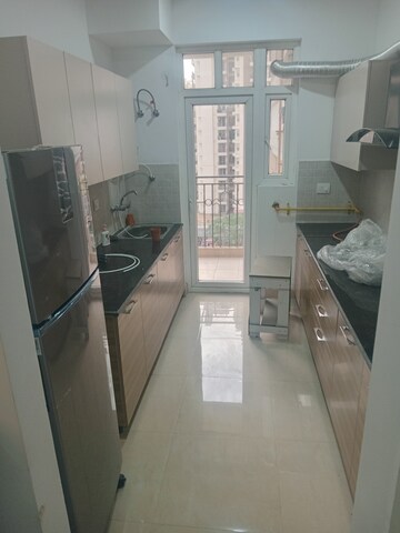 Kitchen in 3 BHK Apartment at ATS Nobility, Sector 4, Greater Noida – for Rent