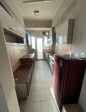 Kitchen in 3 BHK Apartment at Mahagun Moderne, Sector 78 – for Sale