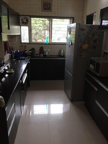 Kitchen in 3 BHK Apartment at Karishma Society, Kothrud – for Rent