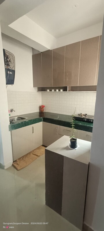 Kitchen in 1 BHK Apartment at Shree Vardhman Green Court, Sector 90 – for Rent